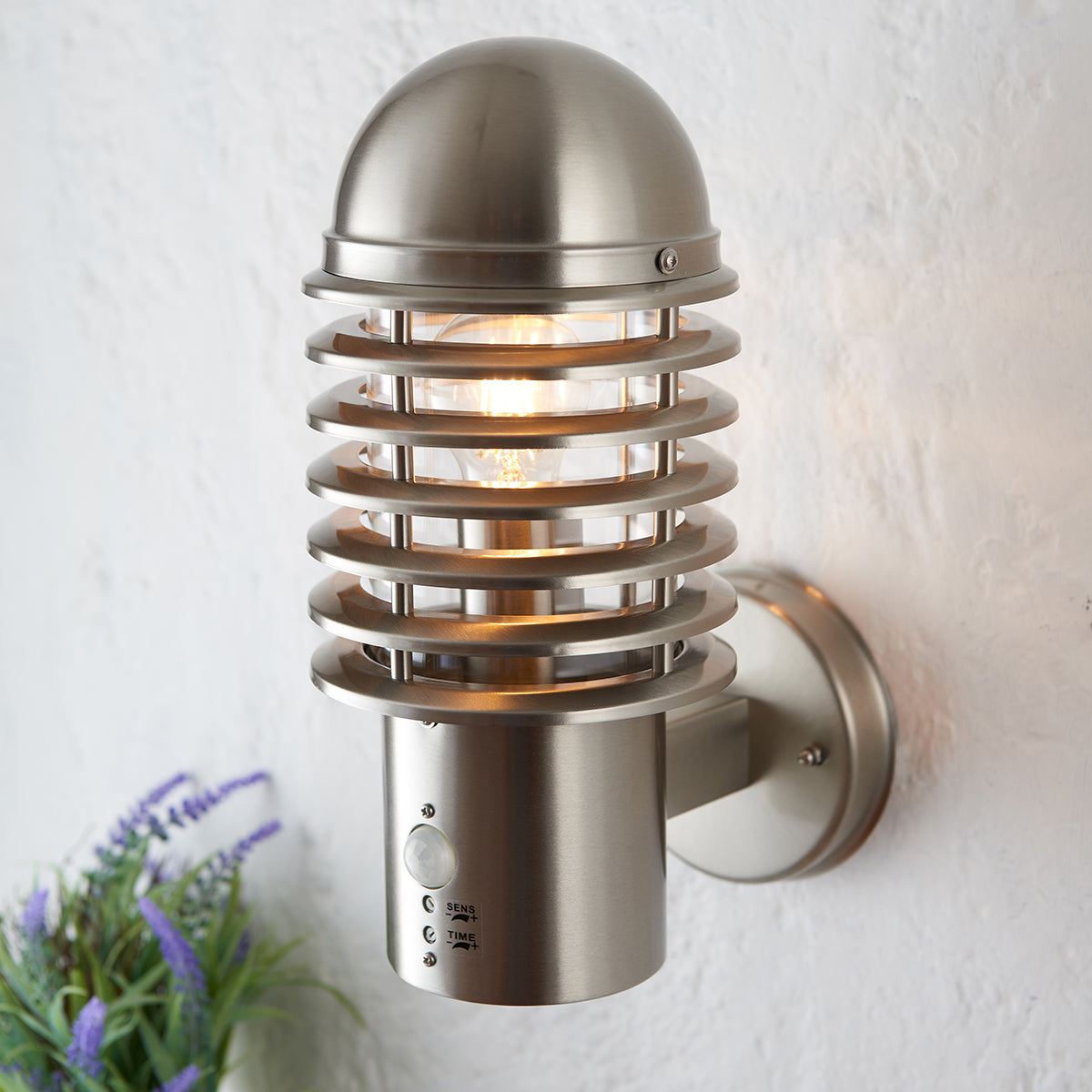 Clara PIR and Photocell Wall Light in Brushed Stainless Steel and Clear Polycarbonate