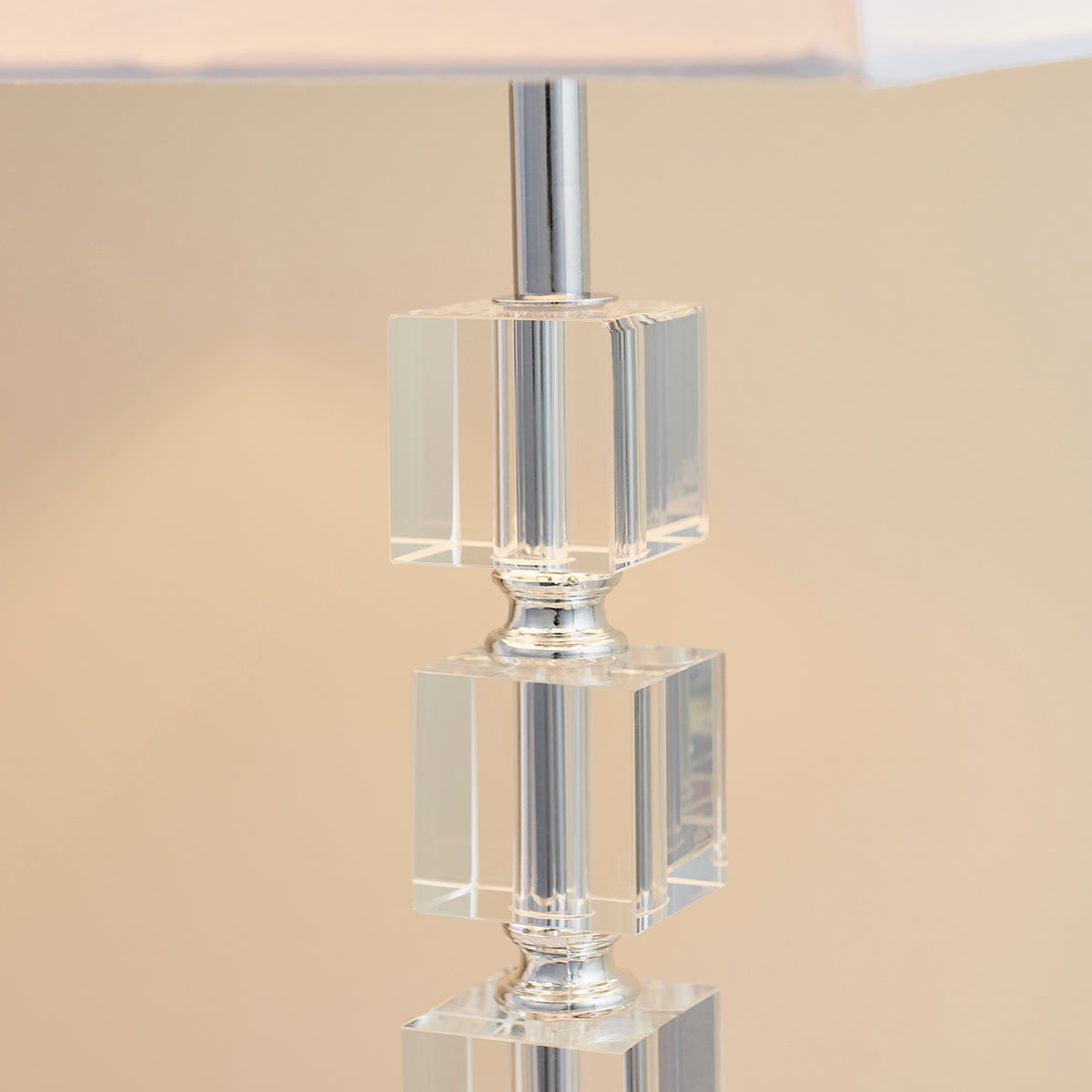 Chrome plate, clear acrylic with white fabric