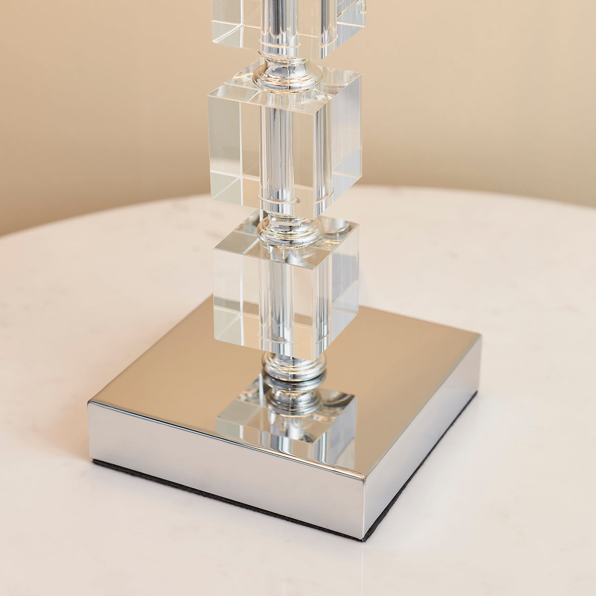 Chrome plate, clear acrylic with white fabric