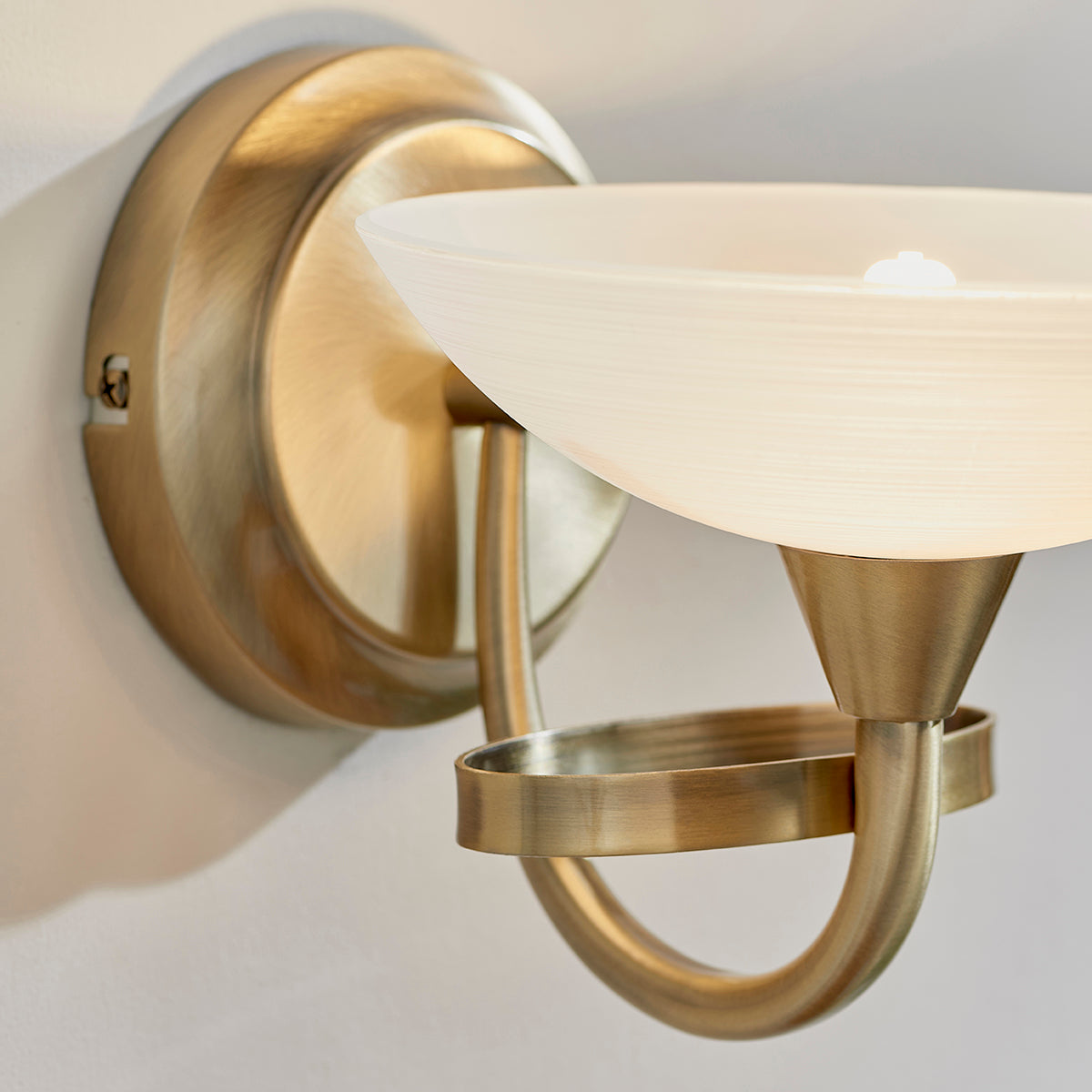 Antique brass plate & white glass
