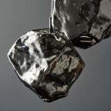 Chrome metallic glass & chrome plate