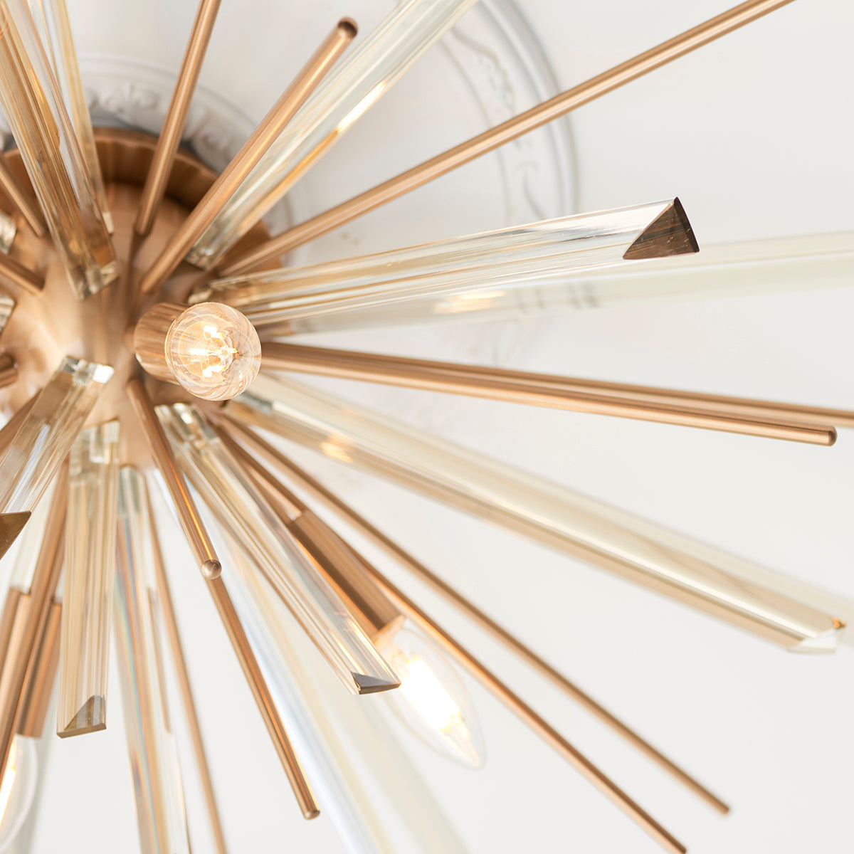 Juno Flush Starburst Ceiling Light in Antique Brass