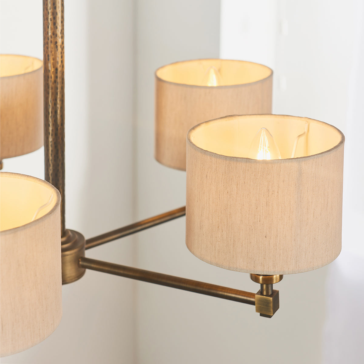 Isaac Five Light Pendant in Hammered Bronze